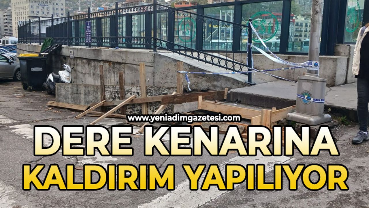 Dere kenarına kaldırım yapılıyor