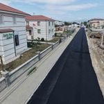 Başkan Özlü direksiyonu geçti yeni asfaltlanan yolları yerli otomobil ile test etti