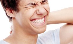 İş stresi "diş sıkma" problemine yol açabiliyor