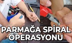 Parmağına spiral makinesi ile operasyon