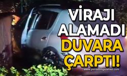 Virajı alamadı duvara çarptı: Aracın içinde sıkıştı!