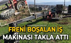 Freni boşalan iş makinası takla attı