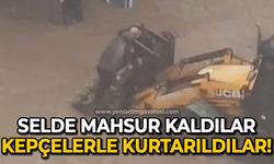 Selde mahsur kaldılar: Kepçelerle kurtarıldılar