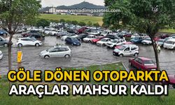 Göle dönen otoparkta araçlar mahsur kaldı