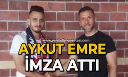 Aykut Emre imza attı