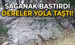 Sağanak yağış bastırdı: Dereler yola taştı