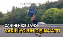 Canını hiçe saydı: Varili yolun dışına attı