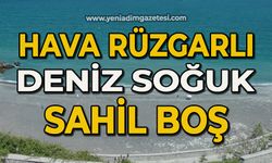 Hava rüzgarlı, deniz soğuk, sahil boş