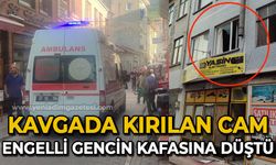 Kavgada kırılan cam engelli gencin kafasına düştü