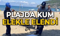 Plajda kum elekle elendi