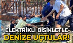 Elektrikli bisikletle denize uçtular: 3 yaralı