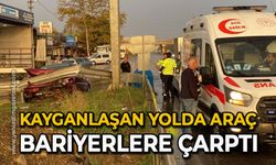 Kayganlaşan yolda araç bariyerlere çarptı: 1 yaralı