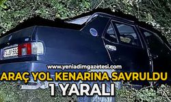 Araç yol kenarına savruldu