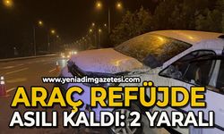 Refüjde asılı kaldı, ağaçlar faciayı önledi: 2 yaralı