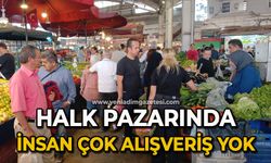 Halk pazarında insan çok alışveriş yapan  yok