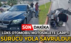 Lüks otomobil motosiklete çarptı: Motosiklet sürücüsü yola savruldu!