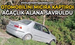 Otomobilini mıcıra kaptırdı, ağaçlık alana savruldu