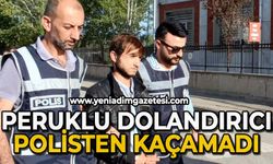 Peruklu dolandırıcı polisten kaçamadı