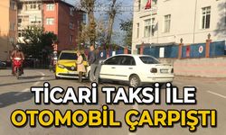 Ticari taksi ile otomobil çarpıştı