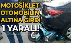 Motosiklet otomobilin altına girdi: 1 yaralı