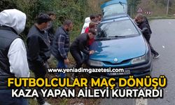 Futbolcular maç dönüşü kaza yapan araçtaki aileye kurtardı