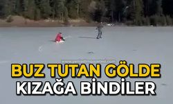 Buz tutan gölette kızağa bindiler