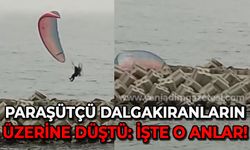 Paraşütçü dalgakıranların üzerine düştü, o anlar kameraya yansıdı