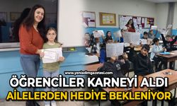 Öğrenciler karneyi aldı: Ailelerden hediye bekleniyor