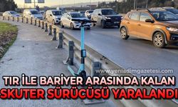 Tır ile bariyer arasında kalan skuter sürücüsü yaralandı