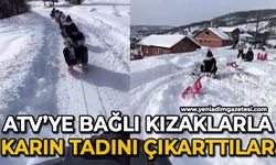 ATV’ye bağlı kızaklarla kayak keyfi yaptılar