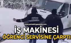 İş makinesinin çarptığı öğrenci servisi metrelerce kayıp duvara çarptı