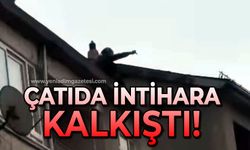 Evin çatısında intihara kalkıştı