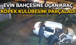 Evin bahçesine uçan araç köpek kulübesini parçaladı