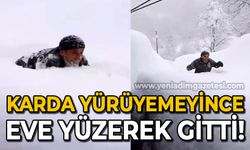 2 metre kalınlıktaki karda yürüyemeyince yüzerek evine gidebildi