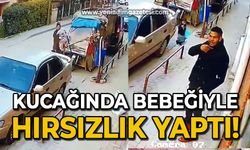 Biri oyaladı, diğeri kucağındaki bebekle çaldı