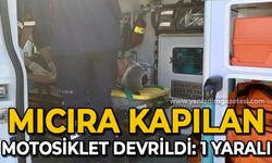 Mıcıra kapılan motosiklet devrildi: 1 yaralı