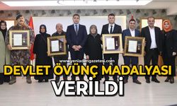 Şahit aileleri ve gazilere devlet övünç madalyası verildi