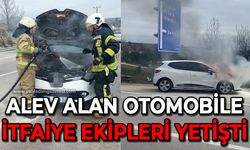 Alev alan otomobilin yardımına itfaiye ekipleri yetişti