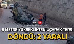 Hafif ticari araç 5 metre yükseklikten uçarak ters döndü: 2 yaralı