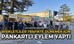 Bisikletliler trafikte ölmemek için pankartlı eylem yaptı