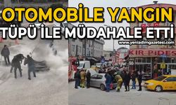 Motor kısmından yanan otomobile yangın tüpü ile müdahale ettiler