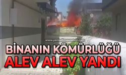 Binanın kömürlüğü alev alev yandı