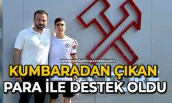 Kumbaradan çıkan para ile destek oldu