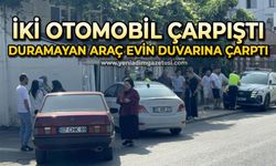İki otomobil çarpıştı, duramayan araç evin duvarına çarptı