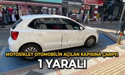 Motosiklet, otomobilin açılan kapısına çarptı : 1 yaralı