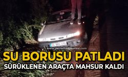 Su borusu patladı, sürüklenen araçtaki sürücü mahsur kaldı