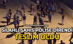Silahlı şahıs polise direndi, teslim oldu