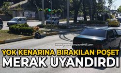 Yok kenarına bırakılan poşet merak uyandırdı