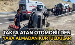 Takla atan otomobilden yara almadan kurtuldular