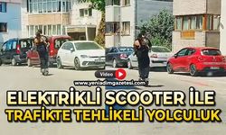 Elektrikli scooter ile trafikte tehlikeli yolculuk
